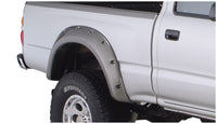 Bushwacker 95-04 Toyota Tacoma Fleetside Découpe Style Flares 4pc 74.5in Lit avec 4WD Seulement - Noir