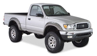 Bushwacker 95-04 Toyota Tacoma Fleetside Découpe Style Flares 4pc 74.5in Lit avec 4WD Seulement - Noir