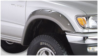 Bushwacker 95-04 Toyota Tacoma Fleetside Découpe Style Flares 4pc 74.5in Lit avec 4WD Seulement - Noir